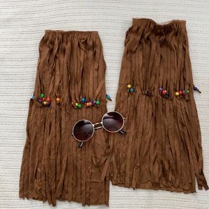 Hippie boot covers and round sunglasses